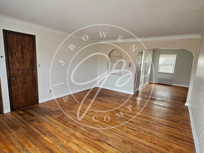 Building Photo - "Charming 2 Bedroom Rental with Hardwood F...