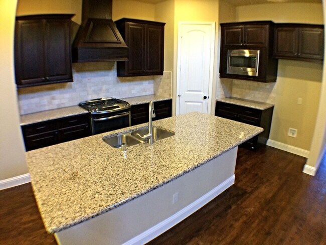 Building Photo - 5 Bdrm/4 Bath / Media Room/ 3300 SF In North Carrollton/Brick And Stone Facade