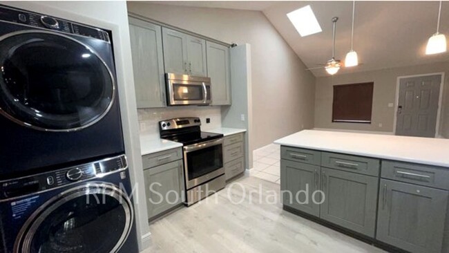 Building Photo - Charming 2-Bedroom, 2-Bathroom Condo in Do...