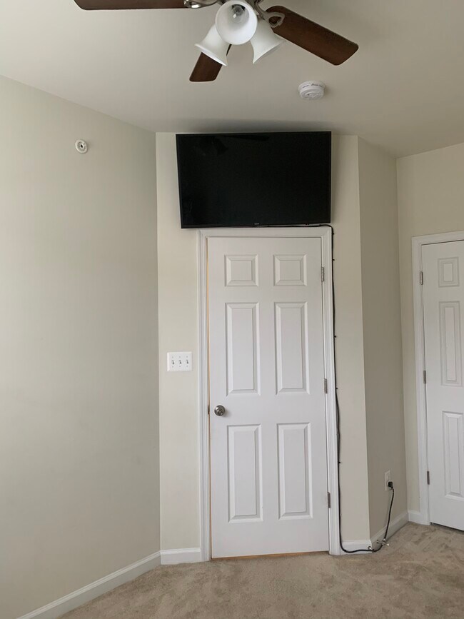 Tv above door included with room rental - 6159 Posey St