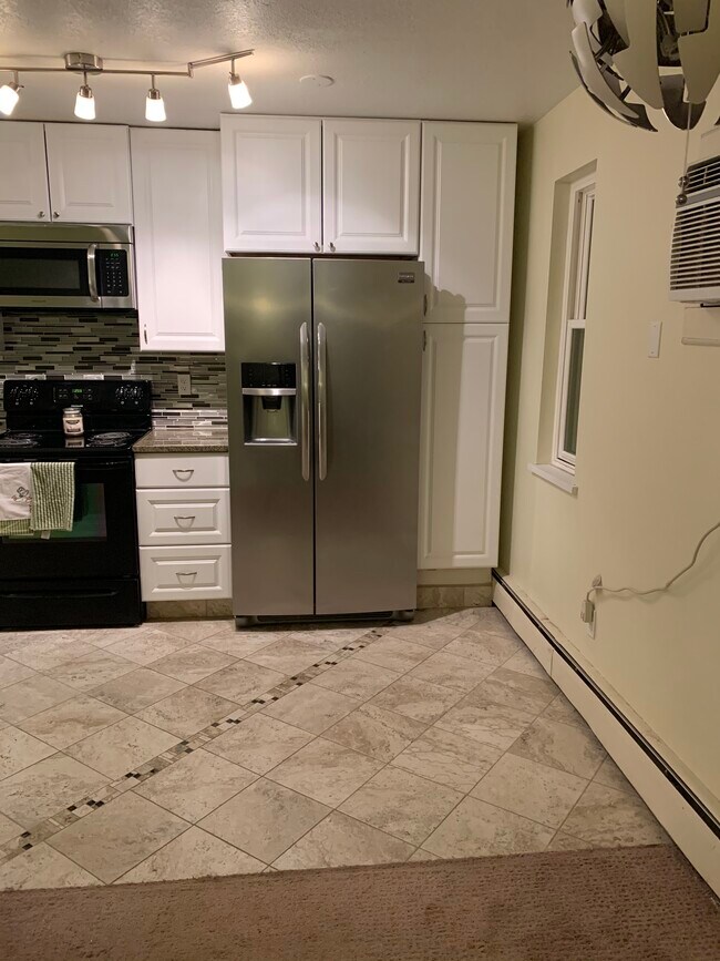 Building Photo - 9380 W 49th Ave
