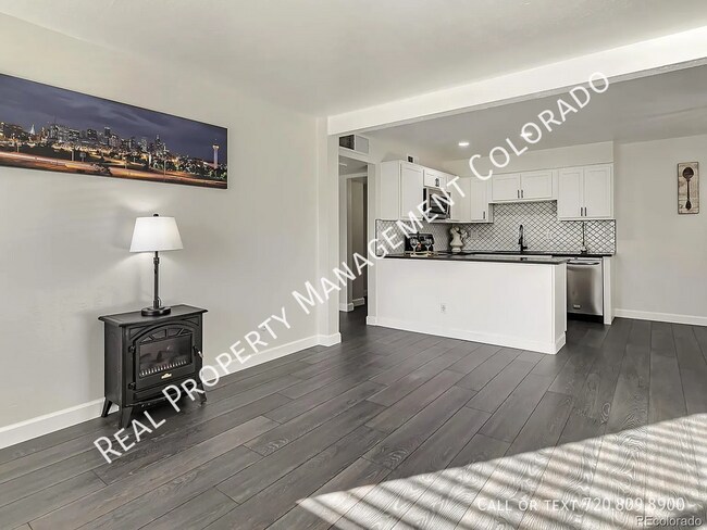 Building Photo - 3613 S Sheridan Blvd Unit 12