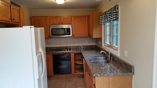 Foto del edificio - 8 Rosewood Ln
