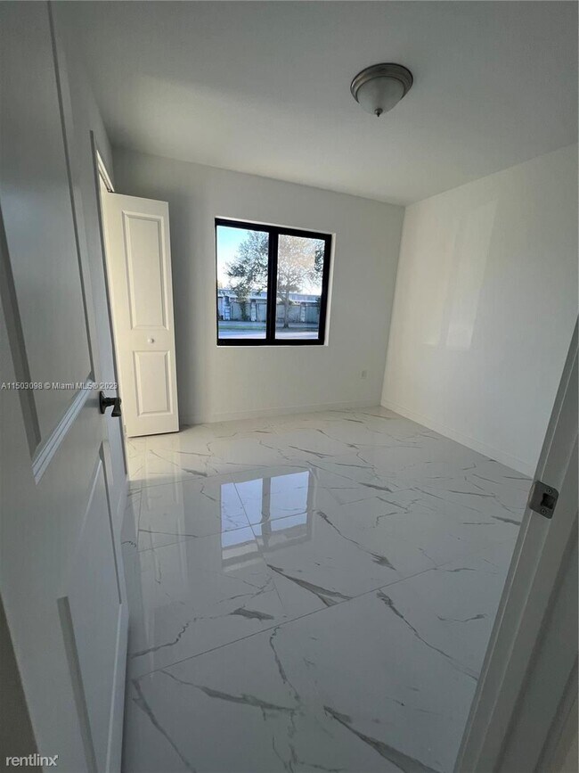Foto del edificio - 3 br, 2 bath House - 7501 NW 16th Ave