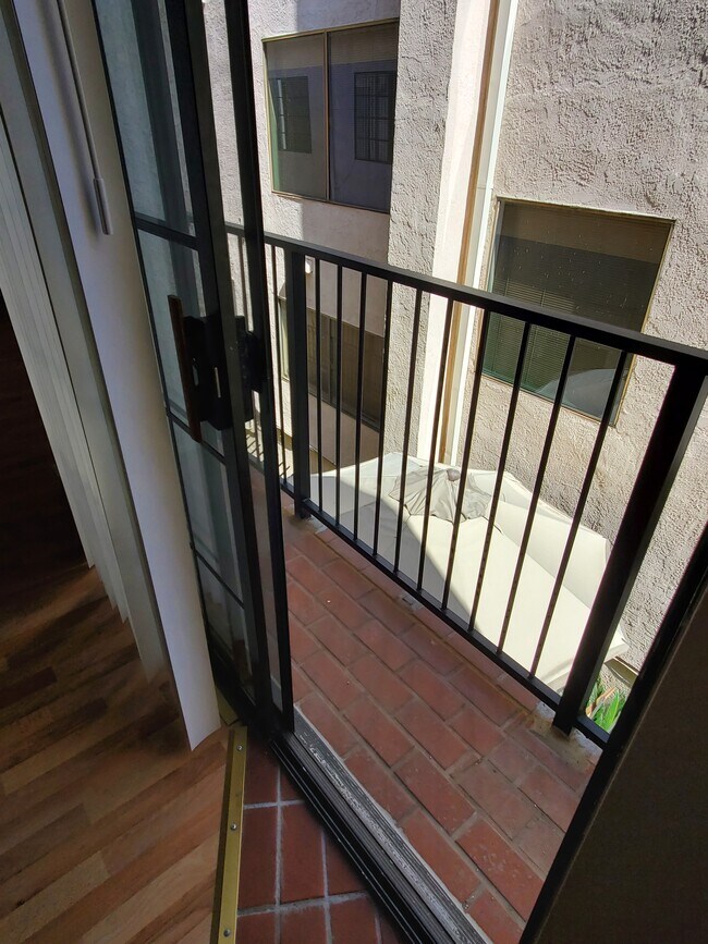 Living Room Balcony - 12821 Caswell Ave