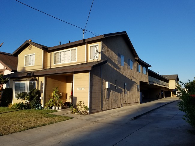 6 units upstairs and 1 unit at ground level. - 15810 Normandie Ave