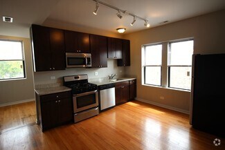 Building Photo - 6447 N Claremont Ave