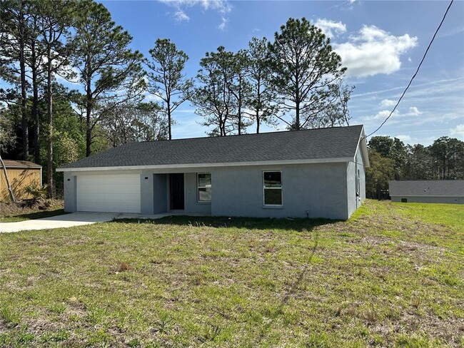 Building Photo - 7061 N Outrigger Terrace