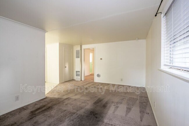 Building Photo - 1401-1403 S Frisco Ave