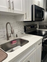 Building Photo - 3675 N Country Club Dr