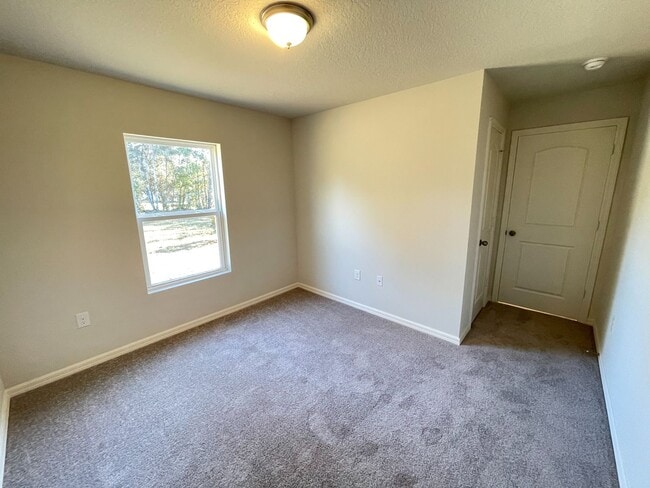 Building Photo - Poinciana Village-1630 Tench Ct Poinciana, FL 34759