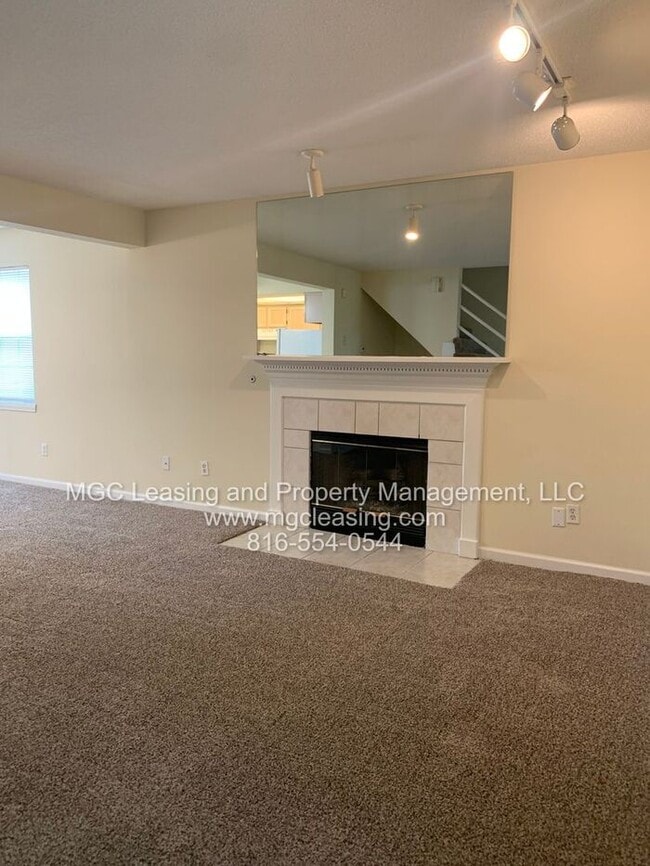 Building Photo - Welcome to Whispering Winds Townhomes – Wh...