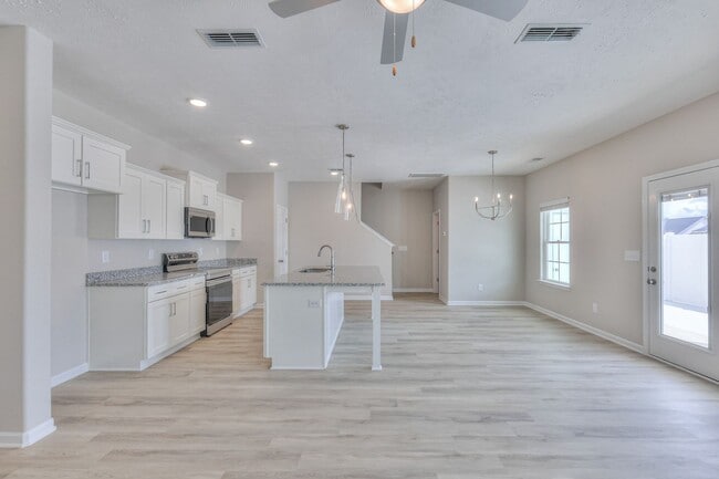 Building Photo - BRAND NEW Luxury 3/2.5 Townhome - MOVE IN ...