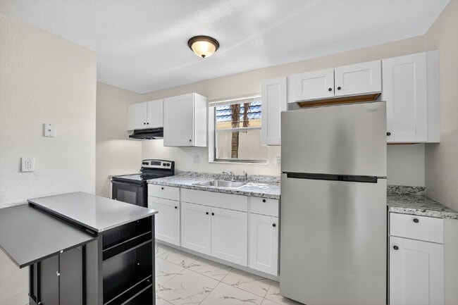 Building Photo - Bright & Modern 1-Bedroom Apartment in Pri...
