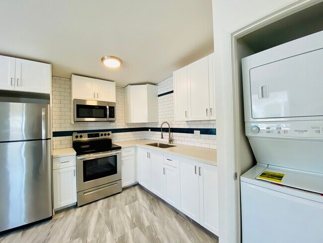 Building Photo - Modern living in this completely remodeled...