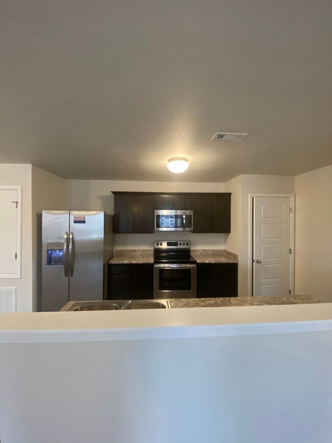 Building Photo - *Half Off First Month's Rent!* Three Bedroom | Two Bathroom Duplex in Lawlis Ranch