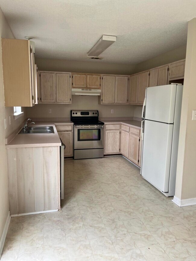 Foto del edificio - 1873 Whispering Oaks Ln