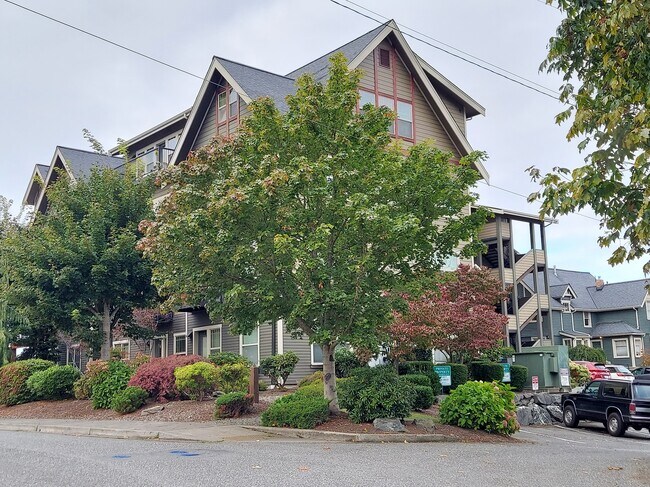 Unit is on second floor, corner, with stair/elevator access, one assigned off-street parking spot - 1000 High St