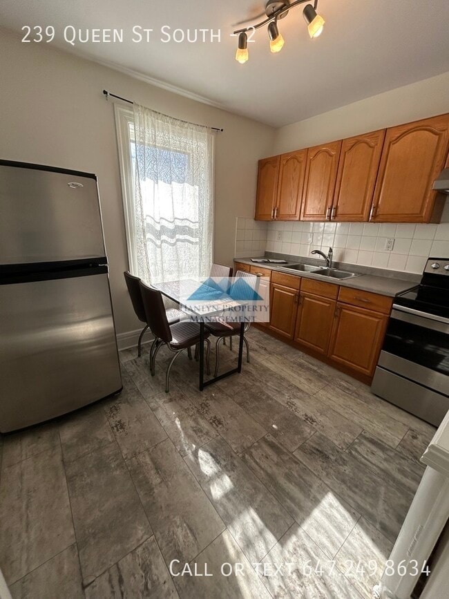 Building Photo - 239 Queen St S