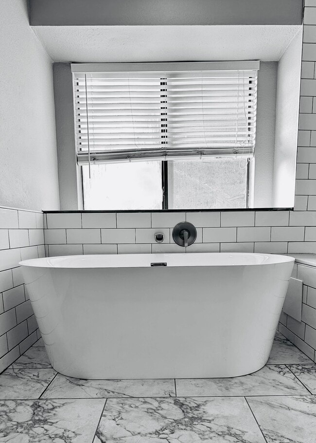 Redone bathrooms - 1542 Glenmore Dr