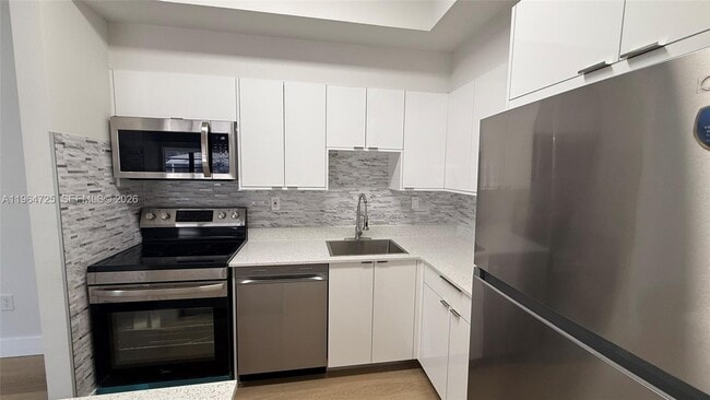 Building Photo - 9705 Hammocks Blvd