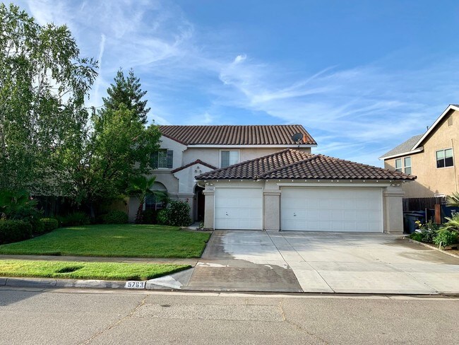 Foto del edificio - 5 br, 2.5 bath House - 5763 W Magill Ave