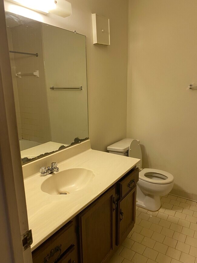 The bathroom mirror has been completely replaced. - 1412 11th St S