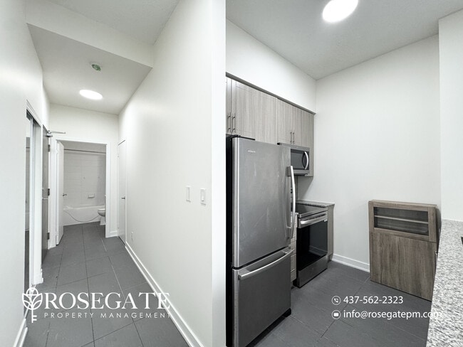 Building Photo - Modern 2-Bedroom Corner Condo with Private...