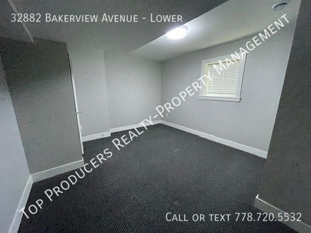 Building Photo - Utilities Included - Ground Level Suite