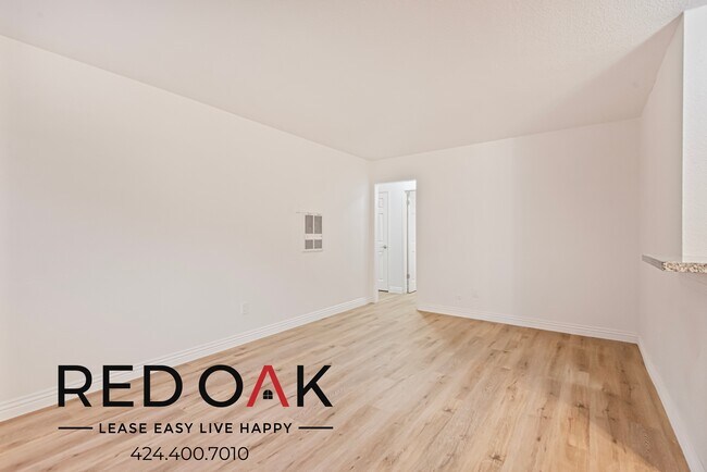 Building Photo - Serene Two Bedroom with an Included Stove/...