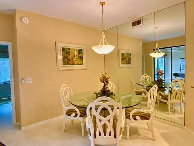 Building Photo - 7032 Pelican Bay Boulevard, Unit 103