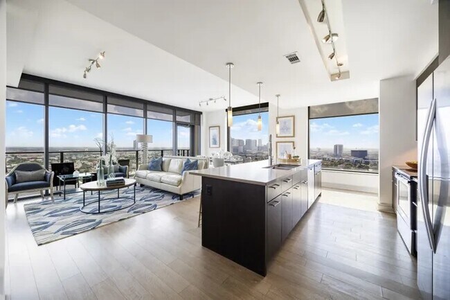 Building Photo - Skyline Views + Luxury Living | Up to 4 We...