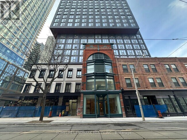 Building Photo - 100 Queen St E