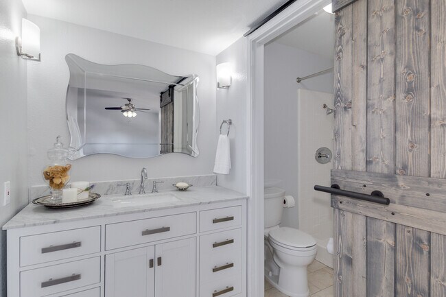 master bath on suite with barn door entry to master bath shower - 6030 N 15th St