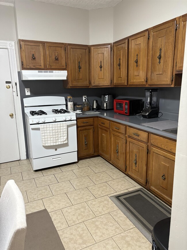 Building Photo - 121-123-123 W 25th St