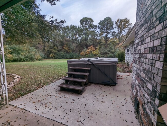 Building Photo - Available Now in PG with Outdoor Hot Tub