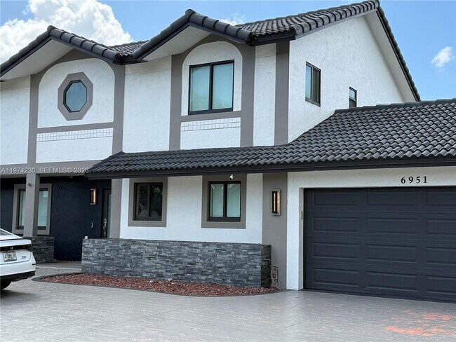 Foto del edificio - 6951 W Wedgewood Ave