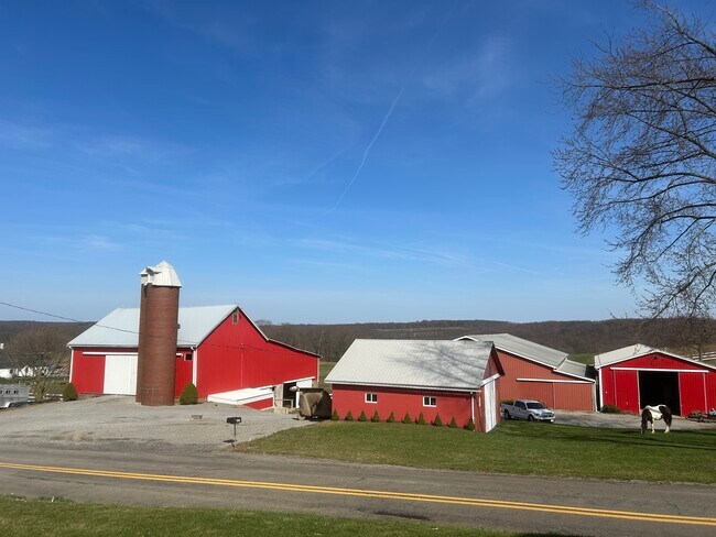 Barns and horse stables across the street. - 203 Reibold Rd