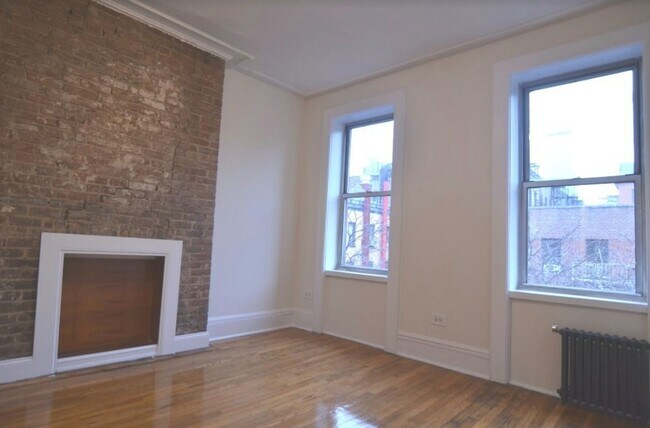 Foto del edificio - 407 W 49th St