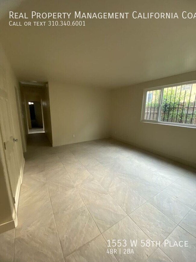 Foto del edificio - 1553 W 58th Pl