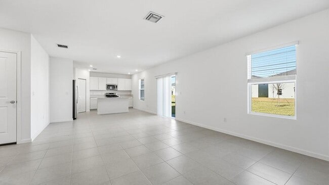 Photo - 10761 Northwest Everbreeze Drive, Port St. Lucie, FL 34987 - 5 BR 3 BA single-family home