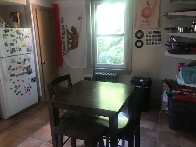 upper floor apt: kitchen facing west - 102 N 35th St