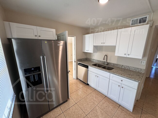 Building Photo - Lovely 3/2 in Orlando, FL - Move-In Specia...