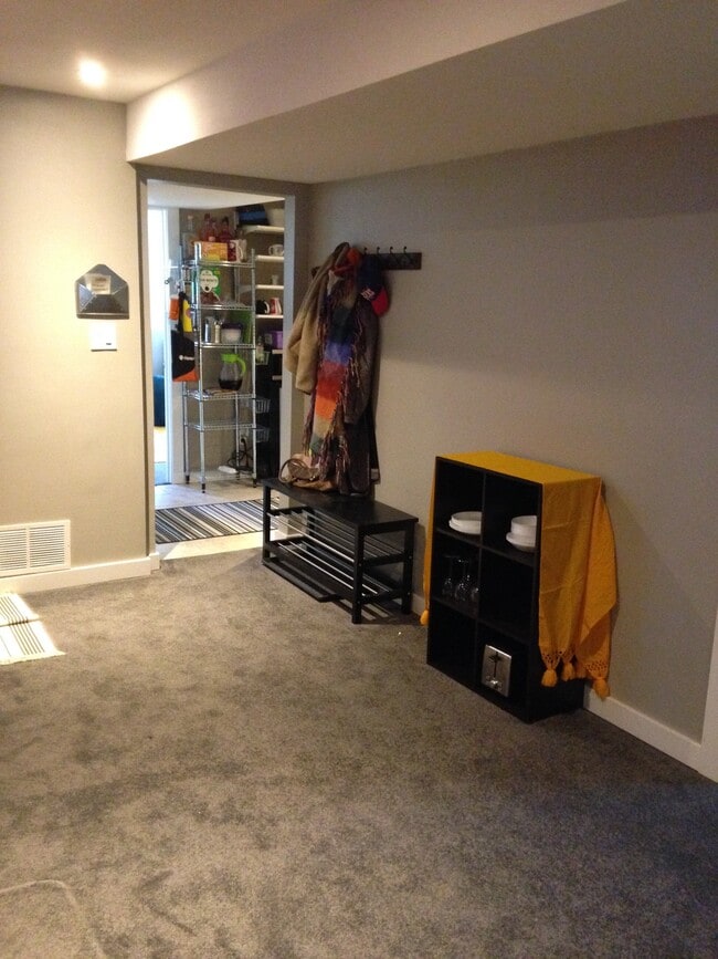 Shared living room and entry to apartment - 14775 W 30th Pl