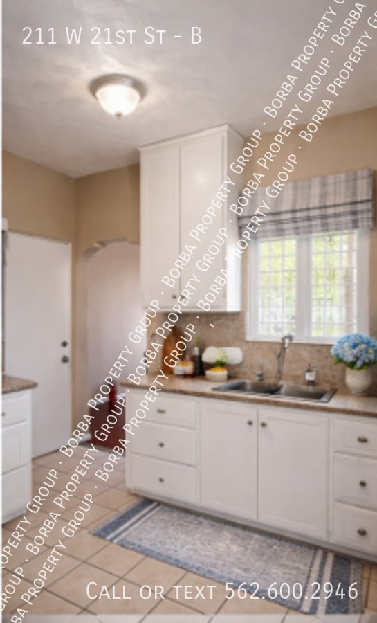 Photo - 211 W 21st St Apartment