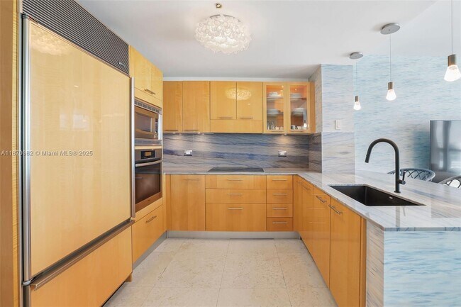 Building Photo - 6799 Collins Ave