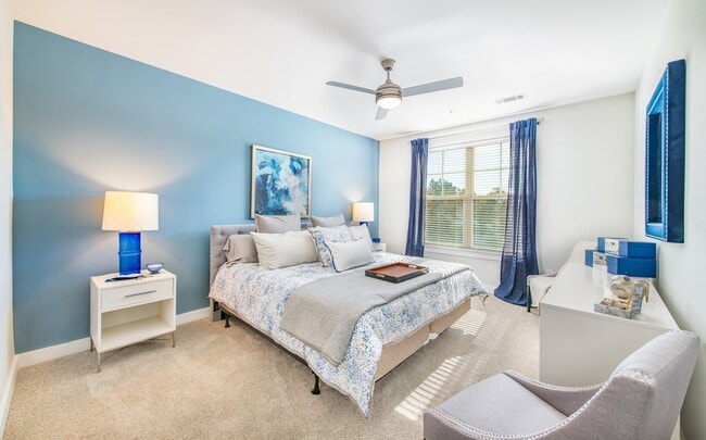 Primary Bedroom - Overture Crabtree 55+ Active Adult Apartment Homes