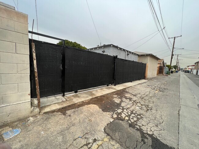 Separate Pedestrian Gate into Backyard - 6414 Easton St
