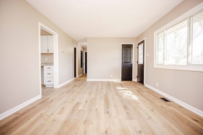 Building Photo - Beautifully remodeled three bedroom home a...