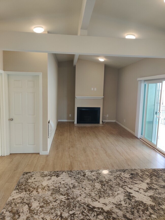 Living room with fireplace - 527 N Juanita Ave